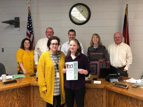 (Lorrie Ross • Clay County Progress) HMS student Lauren Gottlieb (left front) by Hayesville Middle School AIG program director Kim Worley (right front) Gottlieb received a scholarship through the North Carolina Association for Gifted and Talented to do a suicide prevention awareness youth rally. She plans to host “It’s Permanent” Youth Rally on May 31.