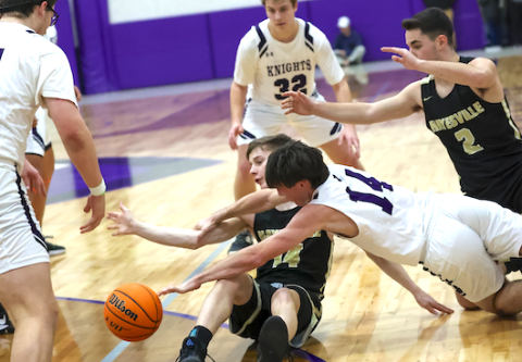 Kolbe Ashe finds himself in a rugby scrum fighting for a loose ball.