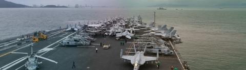Photo from USS Theodore Roosevelt Facebook page The USS Theodore Roosevelt is docked in Guam. Hayesville High School graduate John Buckley Jr. is among nearly 5,000 military aboard the ship. There have now been nearly 100 positive cases of COVID-19 reported on the ship.