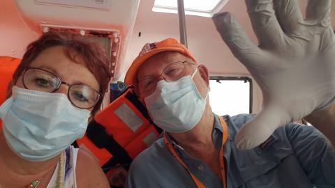 Clay County couple Susanne Treacy and Scott Farnsworth don masks while on a cruise in March. COVID-19 moved into a pandemic situation after they had been aboard for several days.