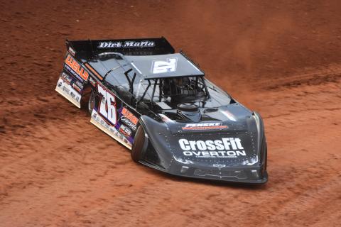 (Photo by Travis Dockery/ Clay County Progress) "Big Sexy" Brandon Overton rips through turns three and four. Overton failed to get the victory at Tri County but picked up two wins over the weekend.