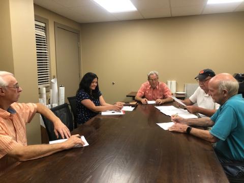 Lorrie Ross • Clay County Progress The Clay County ABC board met in June to approve the 2020-2021 budget, as well as amendments to the current year's budget. Left to right: Board member Carl Patterson, finance officer Olivia Anderson, board chairman Tommy Moore, Hayesville ABC manager Denny Patterson, and board member Buck Shaver.