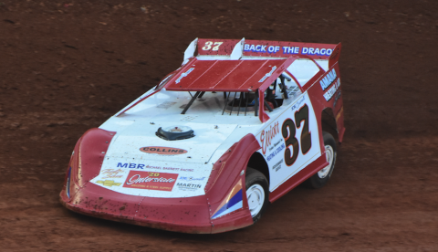 Travis Dockery • Clay County Progress Michael “Spanky” Barnett rips through turn three and his way to a Modified hobby win.