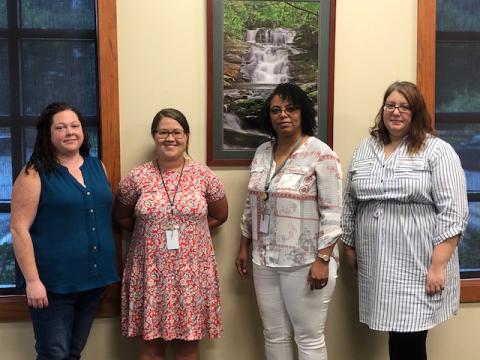 Lorrie Ross • Clay County Progress North Carolina Department of Health and Human Services has officially designated child protective and adult protective services social workers as first responders. Clay County’s Child Protective Services Social Workers, from left, Jennifer White, Katie Brown, Jeryl Holbrook and CPS supervisor Haven Phillips. Scott Whitaker was not present for the photo.