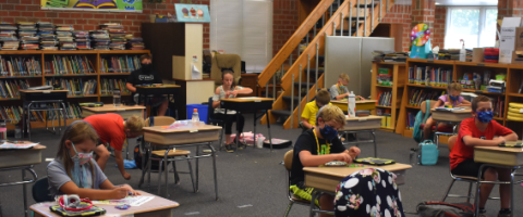 (Travis Dockery • Clay County Progress) Elementary students wear masks and are socially distanced while spending some quality time in the Hayesville school library.