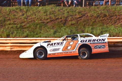 (Travis Dockery • Clay County Progress) David Payne speeds down the straightaway as the eventual winner turns practice laps. 