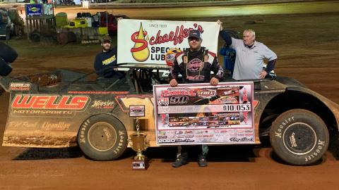 Brandon Overton stands in victory lane after winning his second consecutive “Tarheel 50.” (Cole Perkins • Photo submitted)