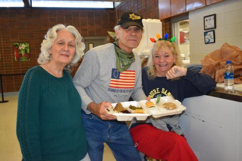 Becky Long • Clay County Progress While they didn’t get to serve the public in person, this trio served the public by preparing hundreds of take-out plates during Saturday’s dinner. They are Sheriff’s Auxiliary members, Hank and Joyce Bomberger and long-time volunteer, Marie Thompson.