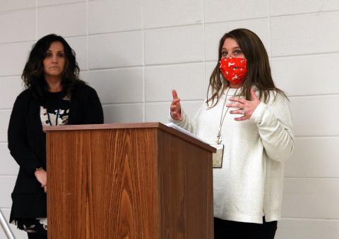 (Jared Putnam • Clay County Progress) Hayesville Elementary School counselor Quincey PattersonRickett speaks while Hayesville Middle School counselor Emily Hedden looks on during the Clay County Board of Education meeting on Monday in Hayesville. PattersonRickett and Hedden spoke to the board about a school-based mental health policy.