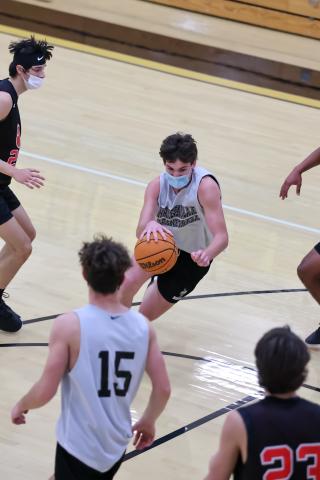 (Kelli Graves • Clay County Progress) Senior Paul White sees an opening and drives through the lane against Franklin.