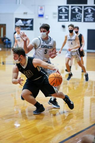 Kelli Graves • Clay County Progress Blake McClure lowers a shoulder and drives past a Black Knight.