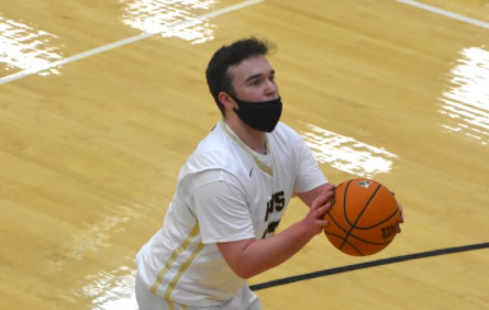 (Travis Dockery • Clay County Progress) Contact under the basket sends Nate Trhlin to the foul line.