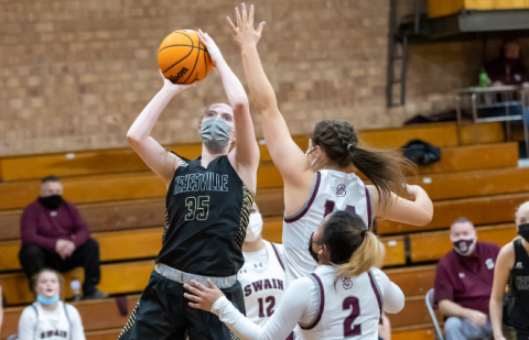 (Kelli Graves • Clay County Progress) Brianna Foster battles under the basket for 2 of her teamleading 20 points.