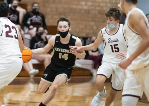 (Kelli Graves • Clay County Progress) Kolbe Ashe dribbles through a slew of Devils in Hayesville's exciting win over Swain.