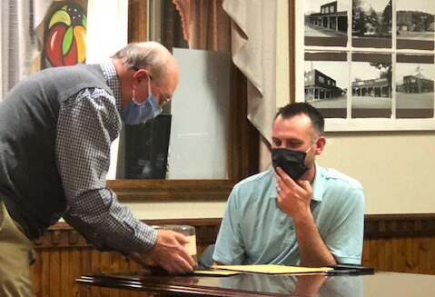 Lorrie Ross • Clay County Progress Hayesville Town Councilman Will Penland attended his last council meeting as a councilman. He is moving outside of town and gave his resignation. Mayor Harry Baughn presented a small cake to Penland, along with a card.