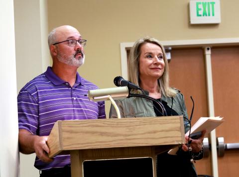 Jared Putnam • Clay County Progress Clay County Recreation Sports Coordinator Jerry Payne and County Manager Debbie  Mauney ask the Clay County Board of Commissioners to approve a Parks and Recreation  Trust Fund grant application during a special called meeting on Friday in Hayesville.