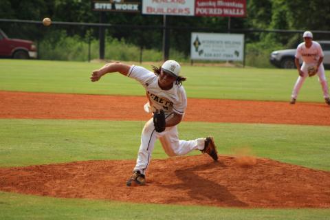 Brooke Leatherwood • Photo submitted Senior gun-slinger Jeremy Stewart slings a strike to his catcher in his perfect game against Cherokee.