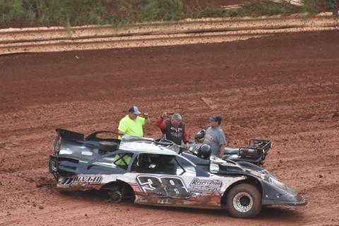 (Travis Dockery • Clay County Progress) Murphy native Jamie Oliver waves to the crowd after a scary rollover accident during hot laps.