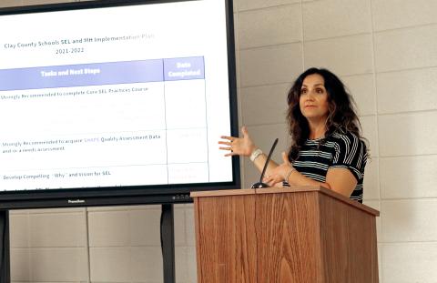 (Jared Putnam • Clay County Progress) Emily Hedden, Clay County Schools' Social-Emotional Learning Coordinator, presents details of the school-based mental health plan to the board of education during the June meeting on Monday in Hayesville.