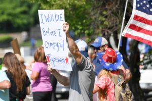  Protesters lined up at Duke Health in Durham to demonstrate their objection to vaccine mandates for employees. (Photo by Maya Reagan, Carolina Journal)