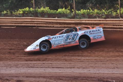 (Photo by Travis Dockery) "The Coach" David Payne puts his No.8 through its paces during practice laps for the "Clarence Barnett Memorial" Super Late Model race. Payne was able to hold off hard chargers to pick up the victory.