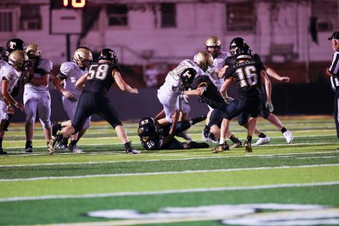  Photo by Kelli Graves Hayesville running back Taylor McClure fights to stay on his feet against Tuscola.