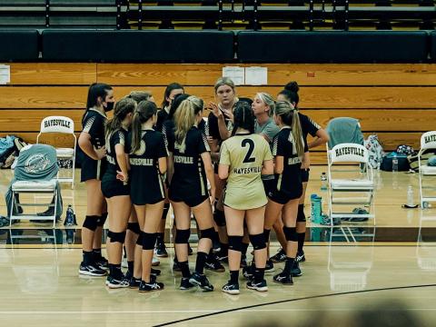 (Photo Submitted) Coach Laurie Shook gives her team instruction during a timeout in Hayesville's win over Cherokee. 
