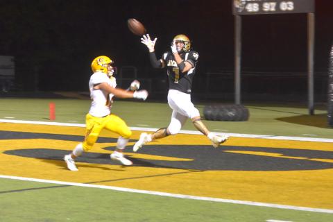 Travis Dockery • Clay County Progress Junior Kyle Lunsford beats a Cherokee defender and takes to the air for a touchdown catch against the Braves.