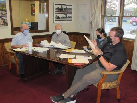 Lorrie Ross • Clay County Progress Hayesville Town Council gets down to business at Monday evening’s meeting. Council members are, from left, Mayor Harry Baughn, Councilman Joe Slaton, Councilwoman Lauren Tiger and Councilman Austin Hedden.