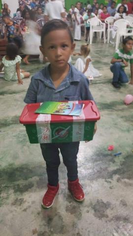 These small boxes, lovingly packed with toys and other items, have been delivered to millions of children around the world.