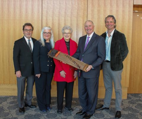 Dr. Keith DeFoor, Cynthia DeFoor, former First Lady Shirley Miller, 1954, Dr. Drew Van Horn, and Jeffrey Bauman with the Kayagum that Miller donated to the College. 
