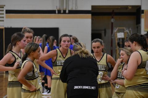 (Photo by Turner Guildrey) Coach Tammy Dills uses a timeout to go over a plan of attack with the Lady Jackets.