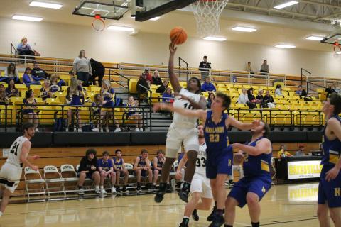 (Deby Jo Ferguson • Clay County Progress) Asher Brown goes up for 2 of his 14 points in first two quarters of game against Highlands. 