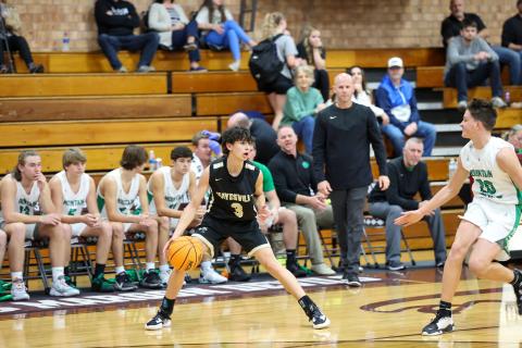 Deby Jo Ferguson • Clay County Progress Ethan Hooper drives down the court in round one.