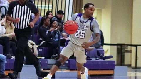 Lenny Pradia controls the floor looking for a game-changing play. (Photo by Steve Miller /YHC Athletics)