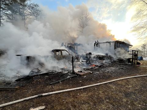 (Photo courtesy of Clay County Fire and Rescue) When members of Clay County Fire and Rescue responded to this house fire in the Town Mountain community, it was fully engulfed leaving behind mostly charred debris.