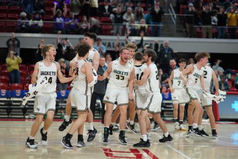 (Photo by Kelli Graves) The Hayesville Yellow Jackets celebrate their 1A state championship as the clock hits all zeros. 