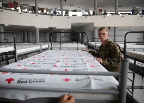 Paratroopers assist in preparing aid for distribution in Poland. Source: 82nd Airborne Division, U.S. Army