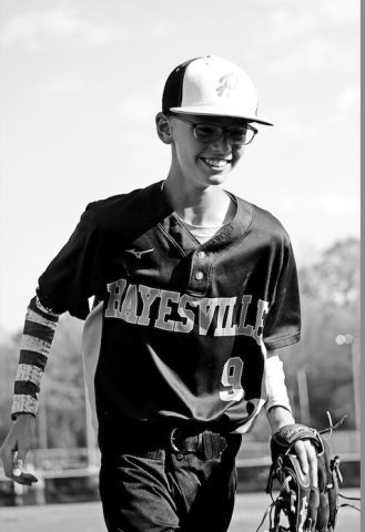 Rebecca Hall • Progress Carter Forbes gets ready to play center field.