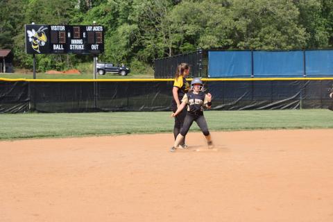 Deby Jo Ferguson • Clay County Progress Callie Long slams a two-base hit and brings it in scoring 2 runs for the Jackets.
