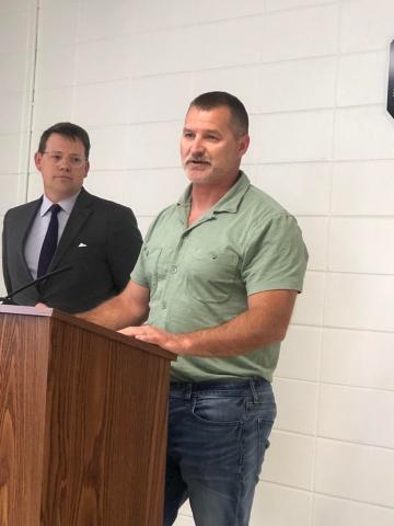 Lorrie Ross • Clay County Progress Clay County Board of Education chairman Dr. Jason Shook expressed his gratitude for the state grant which will build a new school for Clay County. Clay School Superintendent Dale Cole listens nearby.