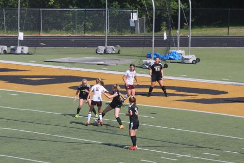 Deby Jo Ferguson • Clay County Progress Cecilia Jones and Trinity Frias team up to steal ball from opponent.