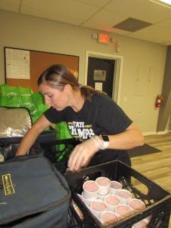 Clay County Senior Center Director Becky Grindstaff spends her Friday mornings packaging food in insulated bags for the day’s recipients. 