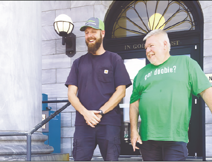 Abigail Hickman • Cherokee Scout Brody White and Bail agent Doobie White feel right at home outside the Cherokee County Courthouse in downtown Murphy.
