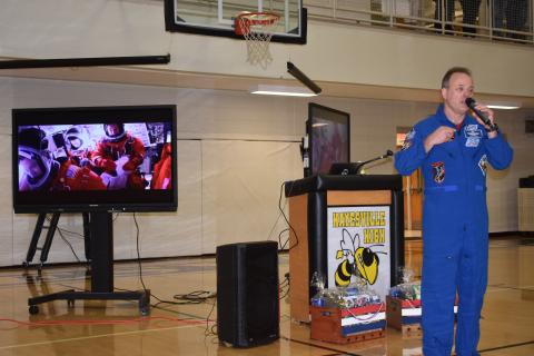Lorrie Ross • Clay County Progress Former NASA astronaut shared slides of his experiences as he spoke to Hayesville students on Friday, Sept. 9. This slide shows him in a rocket with fellow astronauts.
