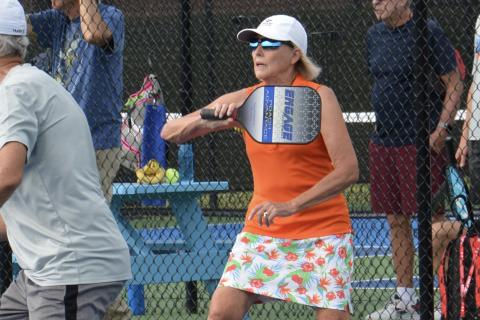 Desna Jarrett competes in a recent doubles game at the new outdoor courts.
