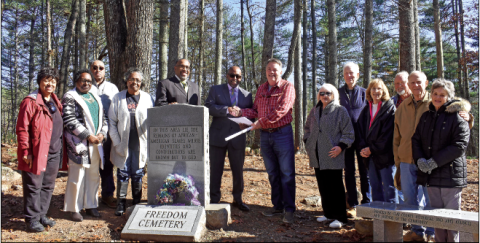 Becky Long • Clay County Progress Gathering for the deed presentation from Rural Development Authority to Ft. Hembree Baptist Church on Friday are, from left, Ann Miller Woodford of One Dozen Who Care, Annie Lloyd, Kent Dorsey, Betty Dorsey, Rev. Tony Barr, Ft. Hembree Pastor Hal Holbrook, County Commission and RDA member Scotty Penland, Betty Bradley, Rob Tiger, Reba Beck, Commissioner Clay Logan, and property neighbors George and Carol Gaines. The Gaines said the cemetery is part of the reason they were a