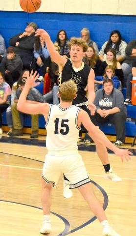 Gary Corsair • Clay County Progress Hayesville's Landon Hughes breaks Nantahala's full-court press with a jump pass to a teammate Tuesday night.