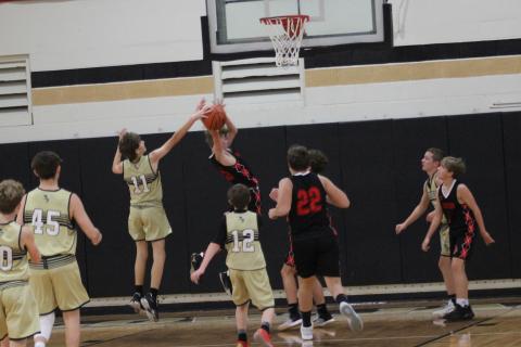 Photo by Kendra Coker Brady Reynolds, No. 1, grabs the ball to prevent a score from a Wildcat.