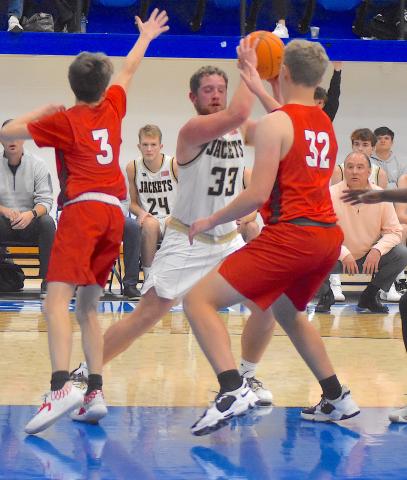 Gary Corsair • Clay County Progress Hayesville center Kyle Lunsford, No. 33, powers through a Polk County double team.